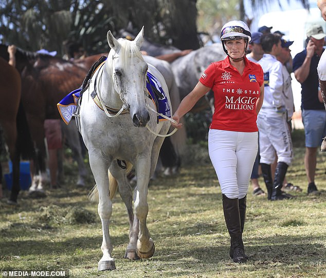 Olympic equestrian Zara looked right at home as she strolled along the beach with her horse