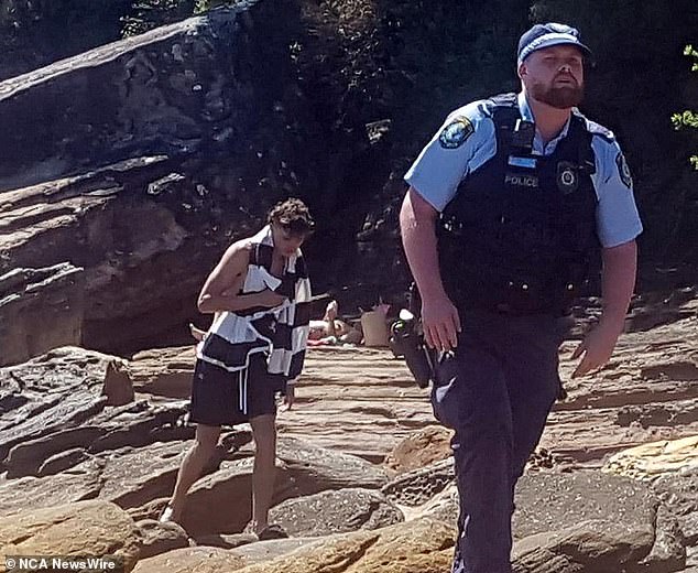 The 1.95m teenager then helped lift Ms Webb's body from the water's edge several meters to a flatter area on top of one of the giant boulders so that medics could treat her.