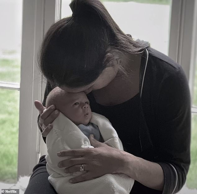 Meghan hugging Archie at Frogmore Cottage shortly after he was born.  The Duke of Sussex said the couple told their son how much they loved him the minute he was born.