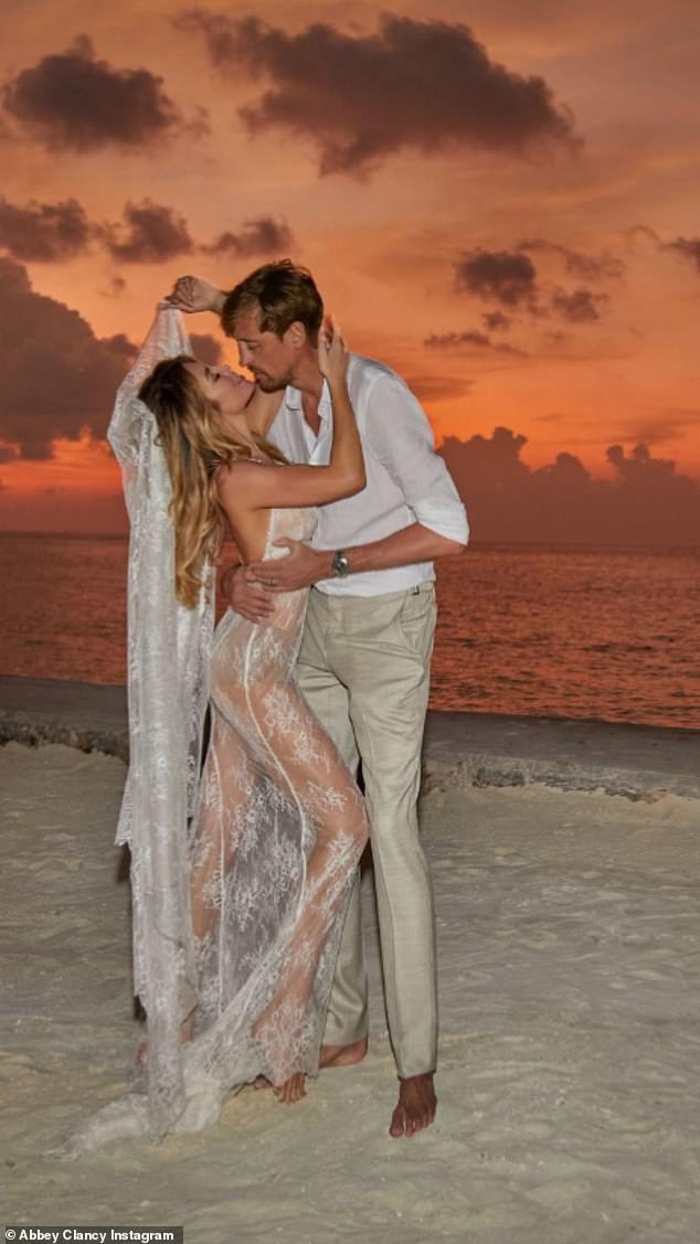 Stunning setting: The model and former footballer said yes at a beachside ceremony in Yje Maldives on December 17 in front of loved ones