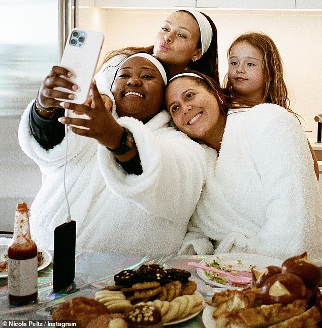 Crew: His squad posed for a selfie in their robes