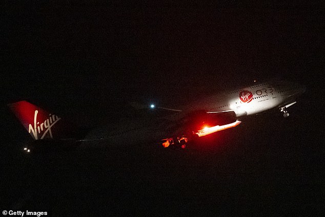 UK history was made on Monday night when a repurposed 747 jumbo jet, named Cosmic Girl by Virgin (pictured), took off from Newquay Airport in Cornwall.