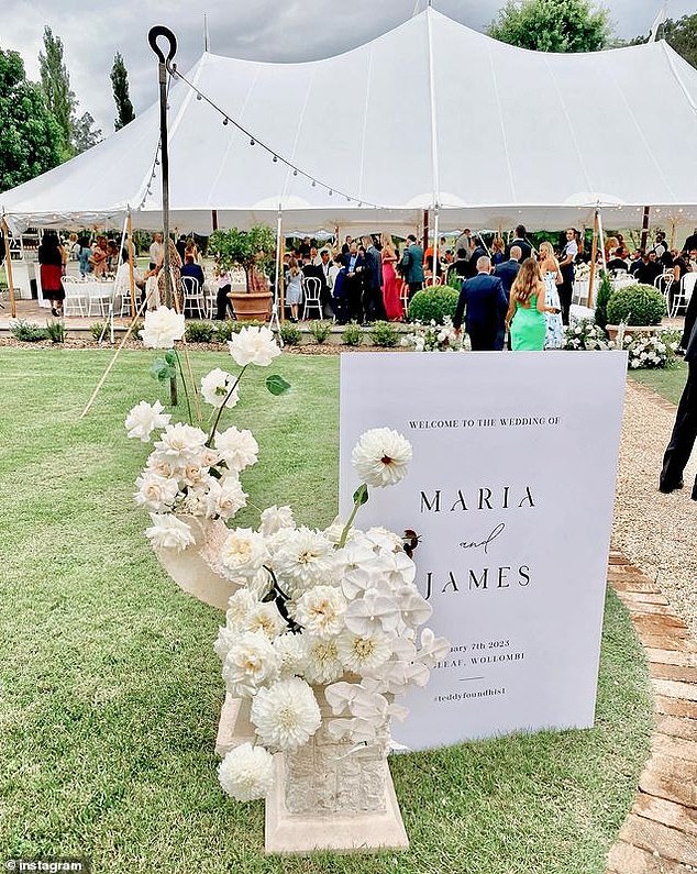 The couple had elegant flowers and banners along with a marquee for the wedding.