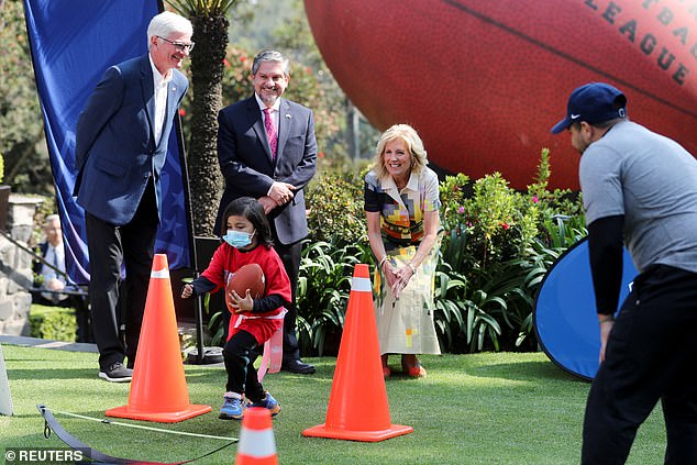 The first lady joined local students for an NFL flag football event in Tochito, which promotes gender equality and the empowerment of girls.