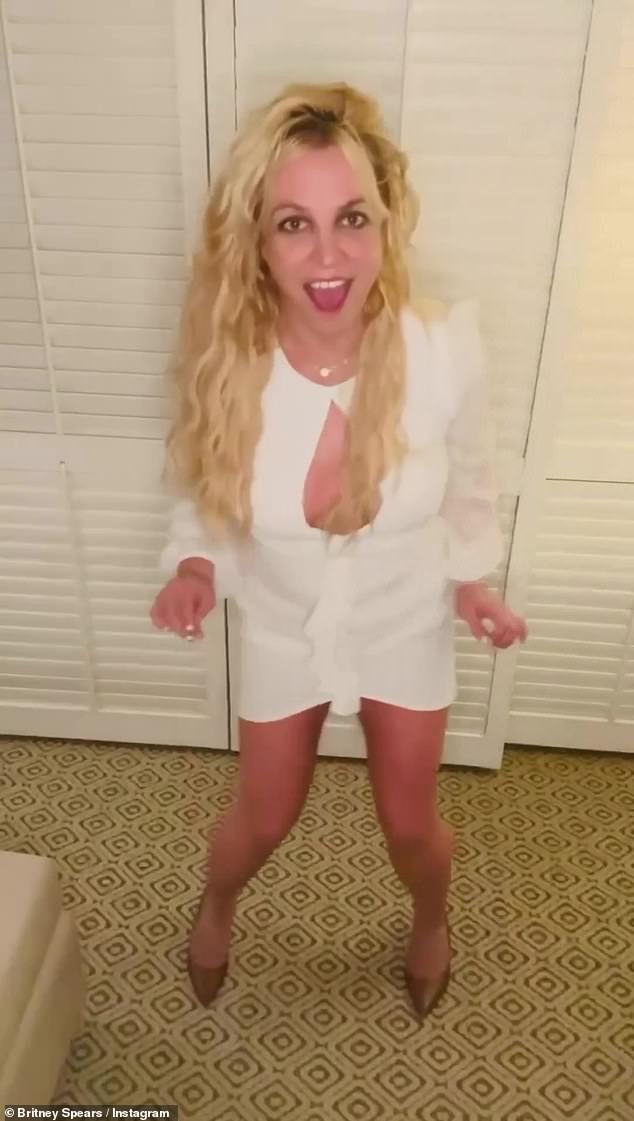 Allegations: The clip showed Britney dancing to one of Justin's biggest hits in a flowing white dress that sported a plunging neckline in the front.