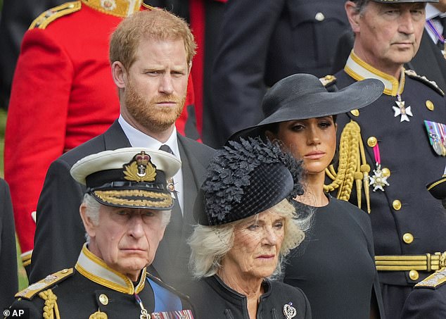 Harry and his father, the King, and their wives Meghan and the Queen Consort as they follow the late Queen Elizabeth II's hearse after the state funeral.