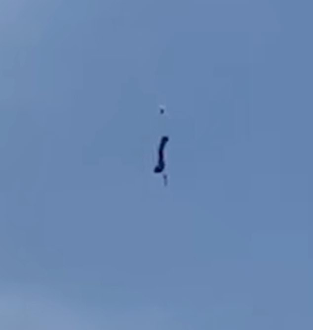 The paratroopers managed to deploy a reserve parachute and land safely on a beach