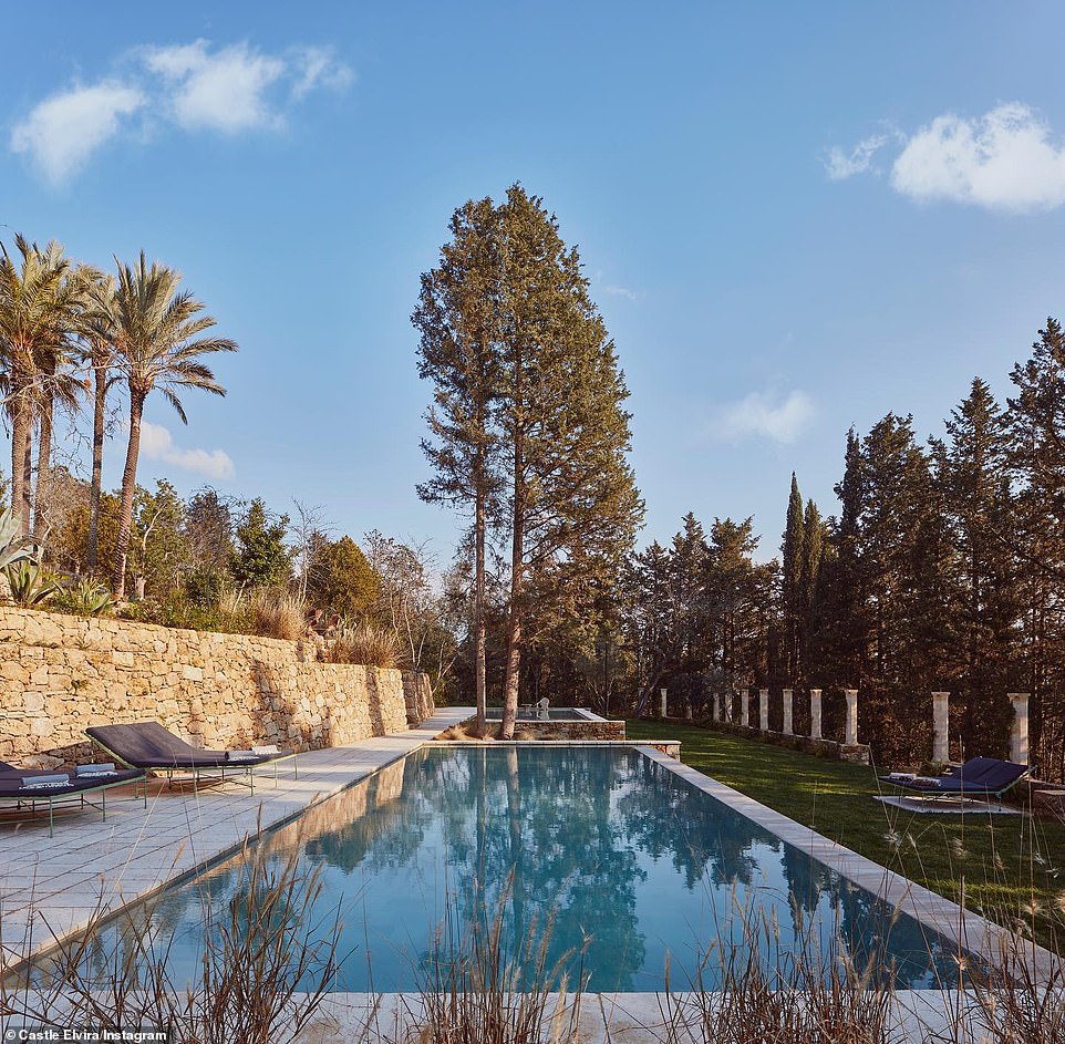 A getaway: the castle has its own private pools and is surrounded by olive and citrus trees.