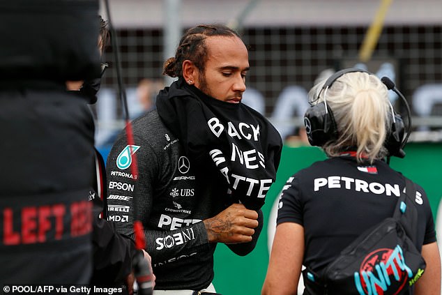 Seven-time world champion Hamilton dons a Black Lives Matter jersey before a 2020 race