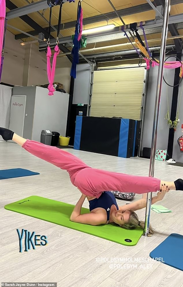 Working out: The actress sizzled as she joked around in an upcoming photo shoot before heading to pole dancing class, where she practiced the splits