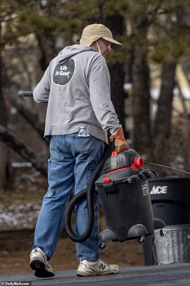 Exclusive photos from DailyMail.com show Michael Kohberger at the family's Pennsylvania home on Sunday, dressed in jeans and a gray hoodie emblazoned with the words 