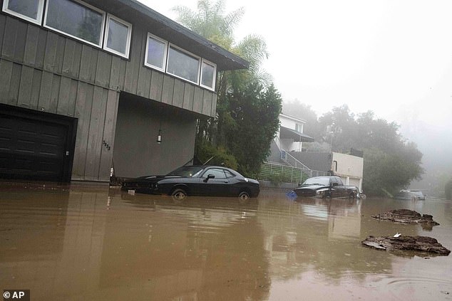 Atmospheric rivers regularly occur across the United States during the winter months, and account for 50 per cent of all rain and snow in the West of the country. Pictured: A mudslide flooded parts of Studio City, California