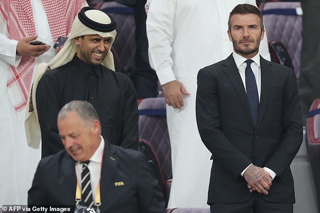 Al-Khelaifi's Qatar Sports Investment are keen to develop their own multi-club model. Pictured: Al-Khelaifi alongside David Beckham at the Qatar World Cup