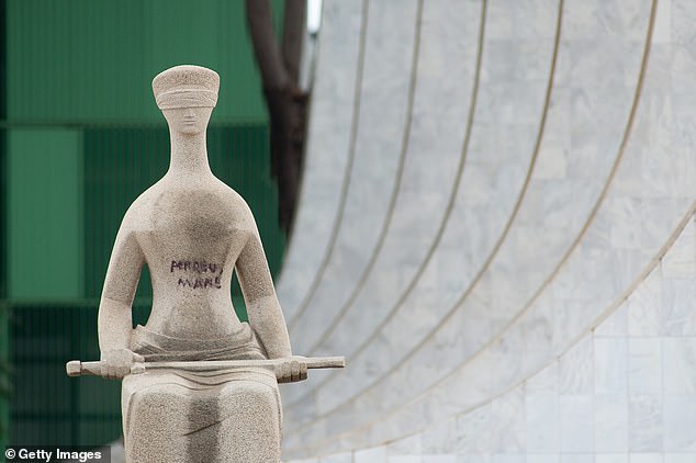 Alfredo Ceschiatti's 1961 'A Justica', the granite statue of a blindfolded woman holding a sword that stood outside the Supreme Court, was vandalized by supporters of former President Jair Bolsonaro.