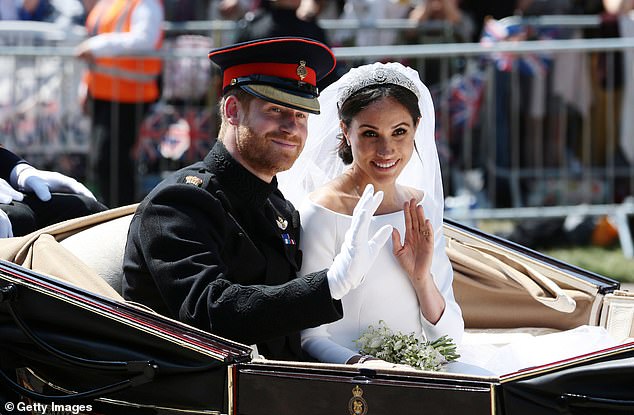 Prince Harry and Meghan Markle were married on May 19, 2018 (pictured during the carriage procession on Castle Hill outside Windsor Castle)