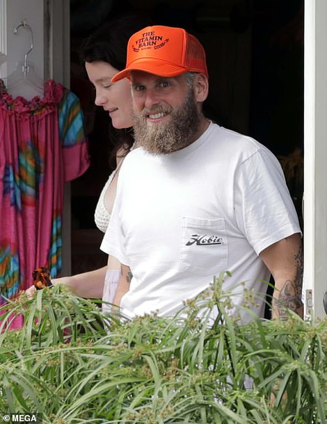 Shopping day: The two lovebirds were seen leaving a store while exploring the tourist destination