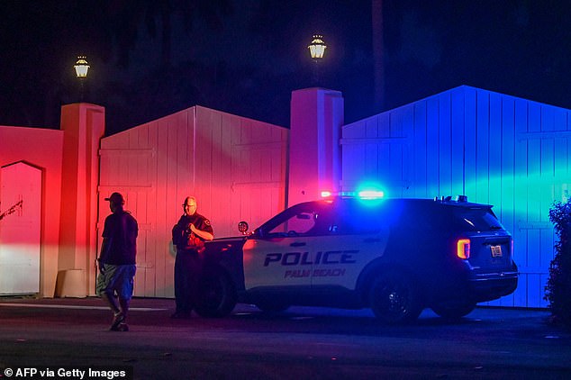 A police car is seen outside former President Donald Trump's residence in Mar-A-Lago, Palm Beach, Florida on August 8 last year, while the FBI searches for confidential papers from the White House