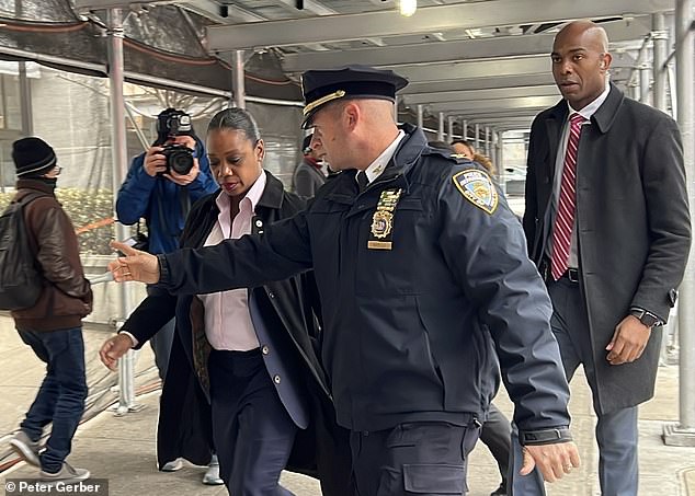 New York Police Commissioner Keechant Sewell arrives on the scene Tuesday.