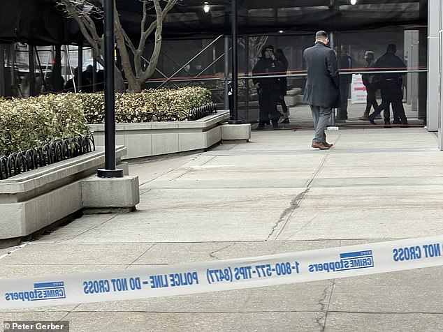 Police at the scene of an officer's suicide in Queens on Tuesday