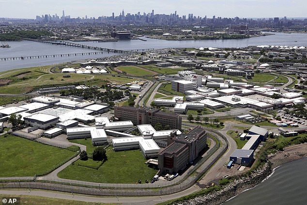 After being sentenced, Weisselberg is likely to be taken to Rikers Island Prison (pictured) and trades in his street clothes for a uniform and slippers with Velcro straps.