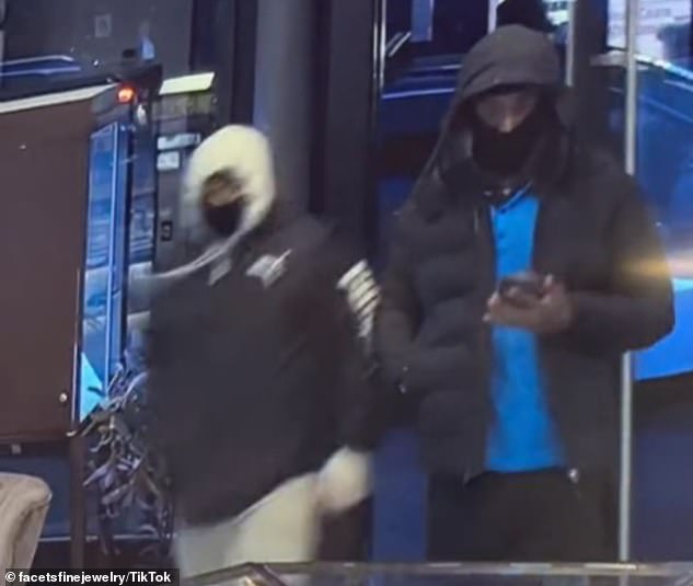 A photo of two of the three men involved in the brazen heist that took place around 5 p.m. Sunday at the Facets jewelry store in Park Slope, Brooklyn.