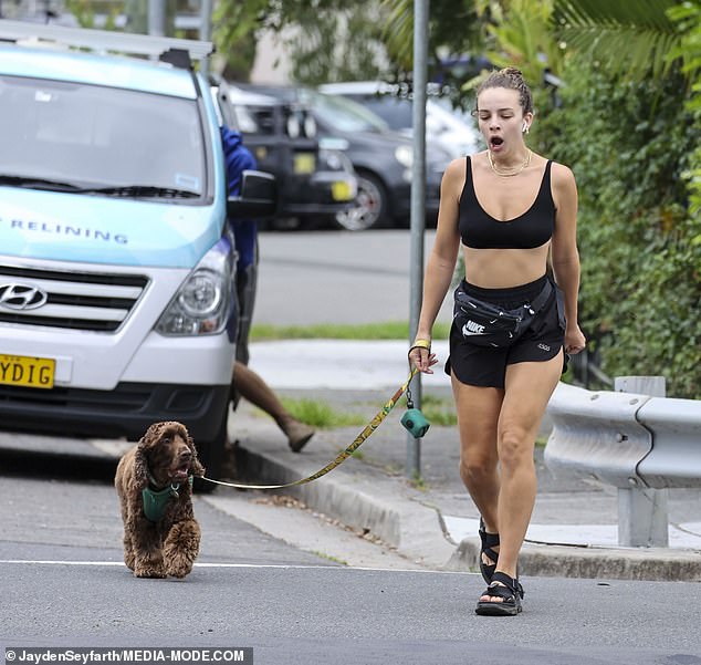 The media personality left her home on Wednesday, still looking tired as she took her rescue spaniel Wally for a walk.