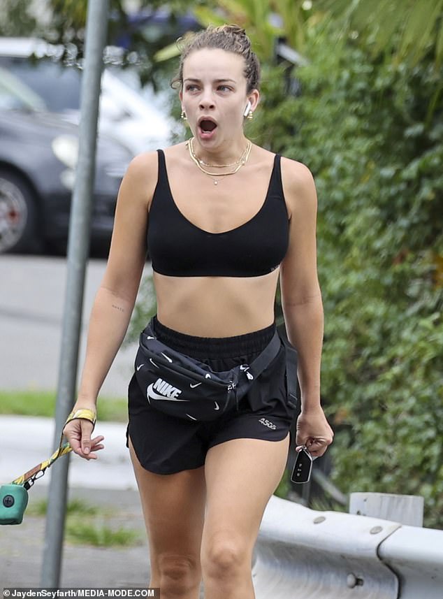 Clad in all black sportswear that showed off her slender figure, the Hot Nights presenter could barely stop yawning as she took a stroll through Bondi.