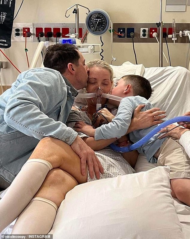 In the hours before her death, Nicole wrote a heartbreaking final message that her family later posted on her Instagram.  The post included this photo from her hospital bed of Nicole with her husband and son.