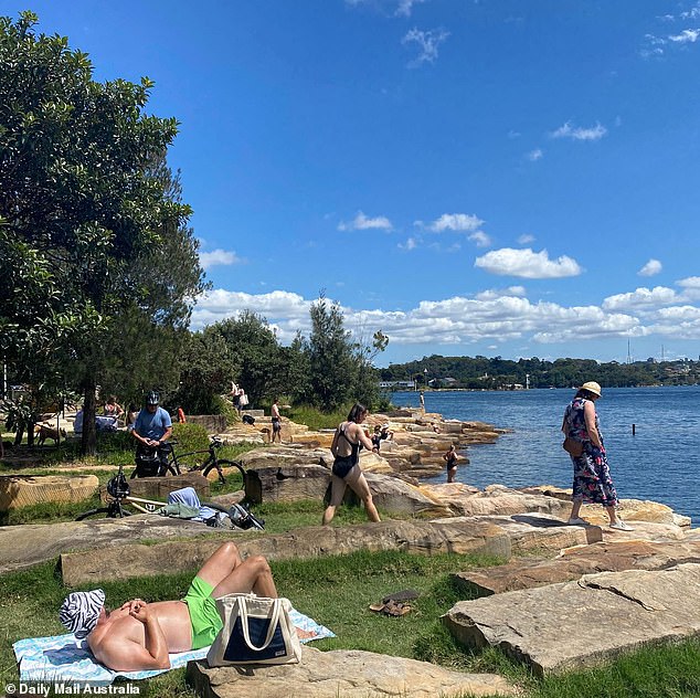 Cyclists and runners had the opportunity to cool off in the salty water while others lay back reading, chatting and soaking up the city sun.