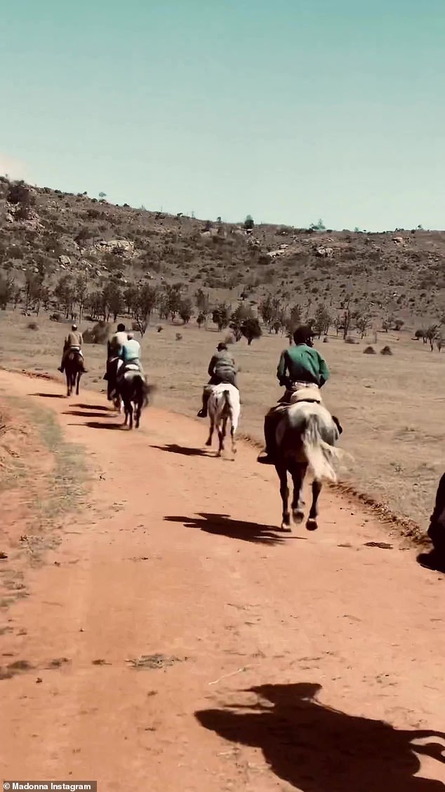 Family Vacation: At the top, there are a couple of shots showing the large open area, followed by the first look at the singer-songwriter's group, all on horseback.