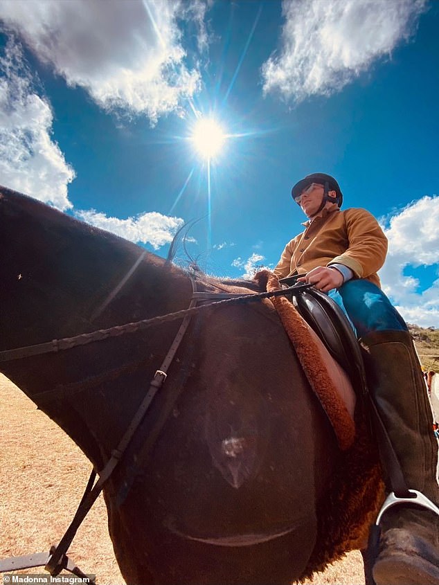 Family affair: It appears Madonna's son Rocco Ritchie, 22, was involved in at least one of the horseback adventures featured in the video.