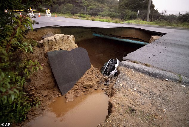 The sinkhole has completely closed Iverson Road in Chatsworth