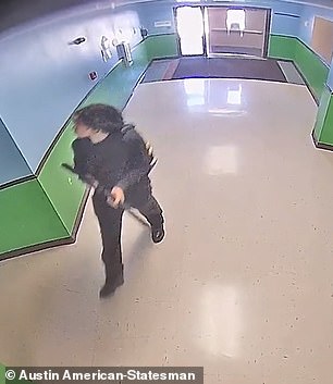 Salvador Ramos is shown entering the school at 11:33 am on May 24 with his AR-15 style weapon in hand.