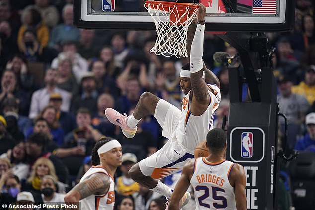 Suns forward Torrey Craig dunks against the Golden State Warriors during the first half