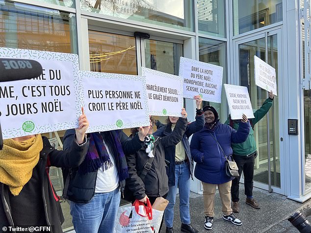 Demonstrators gather in front of the FFF offices, calling for Le Graet's resignation as president.