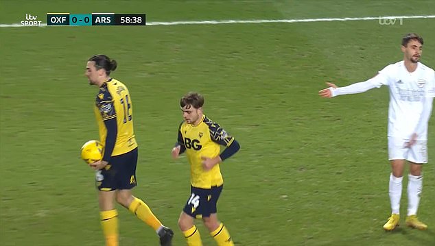 The yellow card was issued after Brown prevented Arsenal from taking a quick free kick.