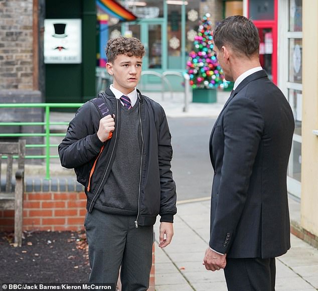 Revealed: The young man later confirms that the father is Ricky Junior (left), the 12-year-old son of Sam Mitchell and Jack Branning.