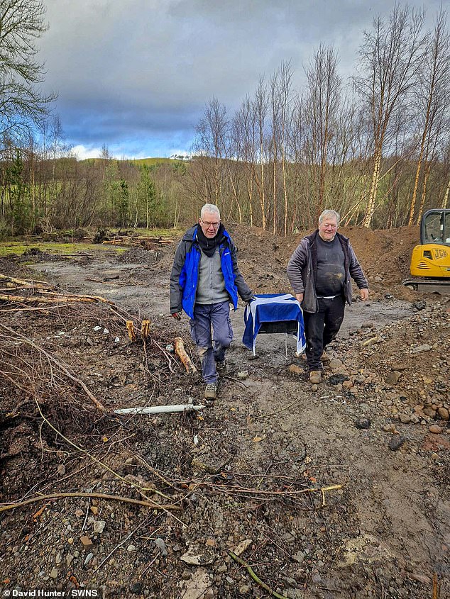 Paul Aitken and George Gordon carry the flag-draped coffin. The Skye terrier, called Bobby, enjoyed a period of fame after the film was released and raised thousands for charity