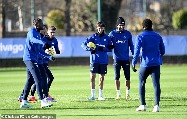 Félix was all smiles at Cobham along with Pierre-Emerick Aubameyang (2nd from right) and Jorginho (3rd from left)