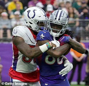 CeeDee Lamb #88 of the Dallas Cowboys and NFC is stopped after catching a pass from Darius Leonard #53 of the Indianapolis Colts and AFC during the 2022 NFL Pro Bowl at Allegiant Stadium this past February