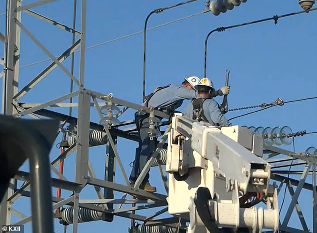 Workers make repairs after an act of vandalism left thousands of people in southern Oklahoma without power in March.