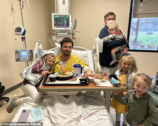 He was asked to wait two hours in the hospital before medics activated the stroke protocol and rushed him to intensive care. MRI and CT scans revealed he had severed one of four main arteries in his neck and suffered three small strokes in the lower area of his brain. He is pictured above in the hospital's intensive care unit with (from left to right) eldest daughter Madelynne, 8, his father Gerard Hentrich, 65, and children Nikolai, 18 months, Liliya, 6, and Elijah, 3