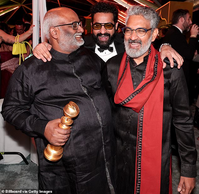 The crew: Keeravani appears at Billboard's Golden Globes after-party with movie star Jr. NTR (center) and its director SS Rajamouli