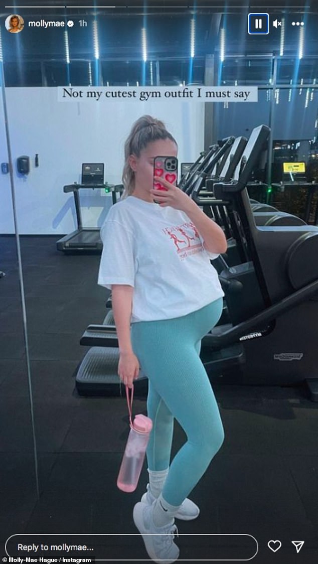 Pose: In another snap, she showed off her belly in comfortable exercise gear as she hit the gym to try and stay in shape during her pregnancy