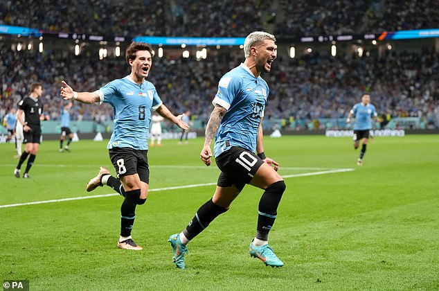 Pellistri (left) made his World Cup debut in Qatar before making his club debut for United.