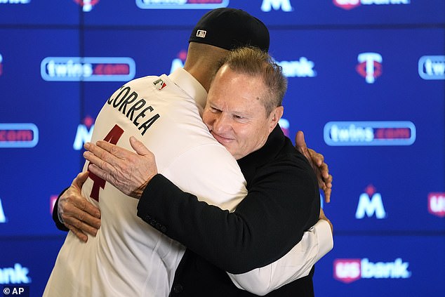 Carlos Correa of ​​the Minnesota Twins, left, and agent Scott Boras embrace after a baseball news conference at Target Field on Wednesday.