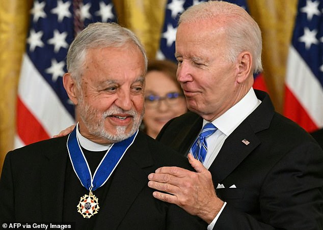 Father Alex Karloutsos, a Greek Orthodox priest, is seen receiving the Presidential Medal of Freedom in July 2022. He was at a 2015 fundraising dinner with Hunter, Hunter's business partners, and Joe Biden, and insists that Joe Biden did not engage with Hunter's associates.