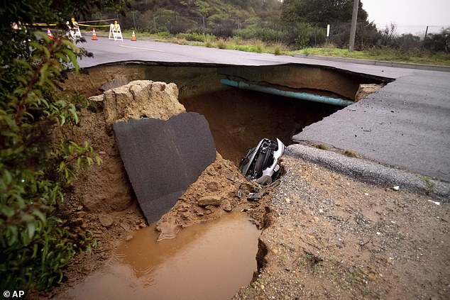 The sinkhole has completely closed Iverson Road in Chatsworth