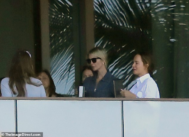 Once home, Ivanka sat outside on her balcony in temperatures of nearly 80 degrees in January with friends.