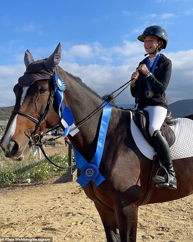 Award Winner: Grace flashed a proud smile in this photo showing her on her horse